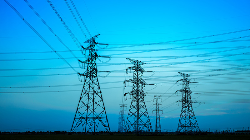 High voltage power tower and beautiful nature landscape at sunse